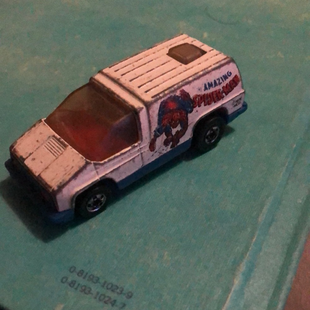 Vintage Hot Wheels 1978 Spider Man with looking through image from the backside